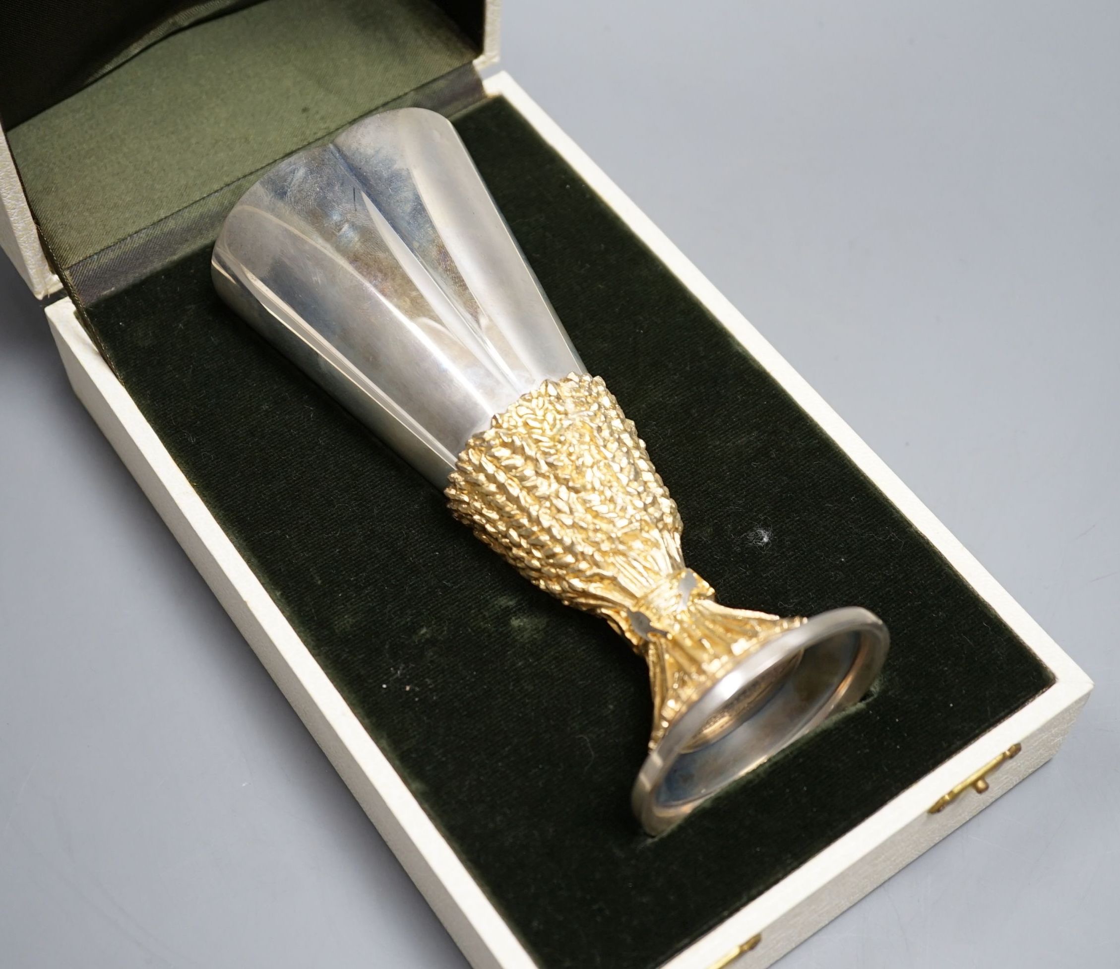 A cased modern Aurum limited edition parcel gilt silver Chichester Cathedral commemorative goblet, no. 304/600, 16.6cm
